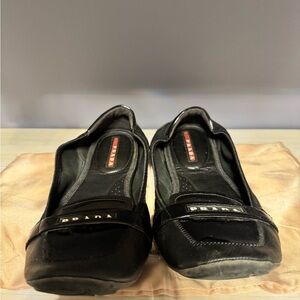 Prada Black Leather Flats with Logo Plaque